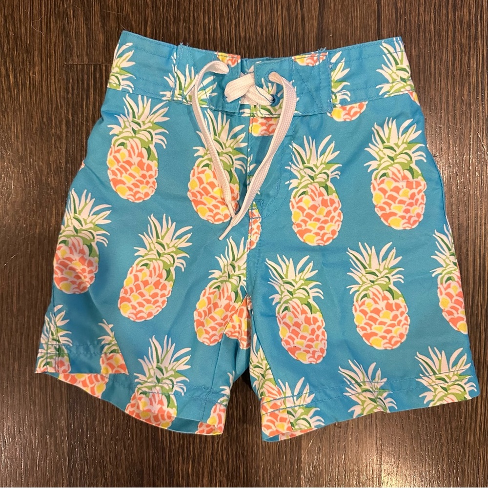Janie and Jack pineapple swim trunks, size 6-12m